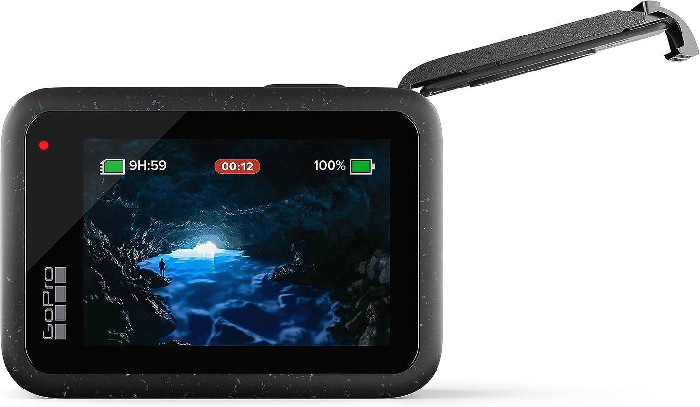 Rear view of the GoPro Hero 12 with the lid open, revealing the touchscreen interface and battery slot