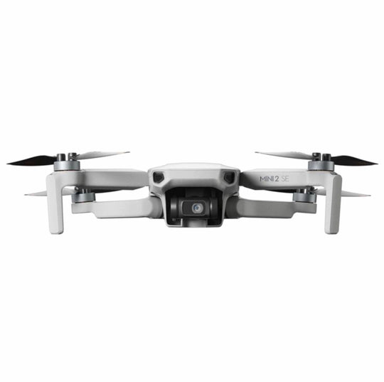 Front view of the DJI Mini 2 SE drone, displaying its camera and propellers in an unfolded state