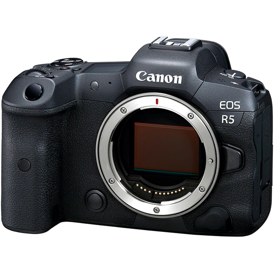 The Canon EOS R5 Mirrorless Camera Body alongside included accessories such as the battery, charger, neck strap, and user manual.