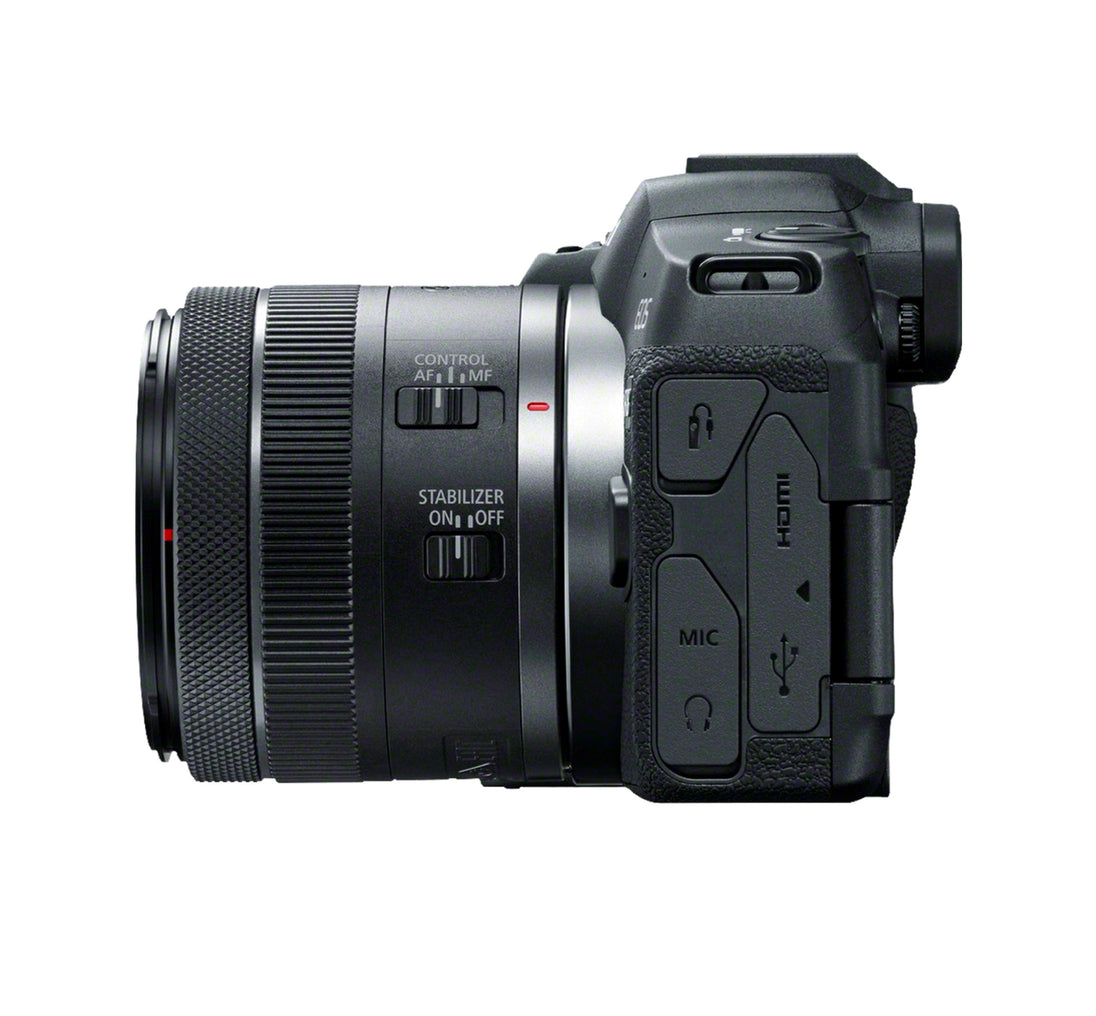 Side view of the Canon EOS R8 with RF 24-50mm lens, showcasing its compact and lightweight design.