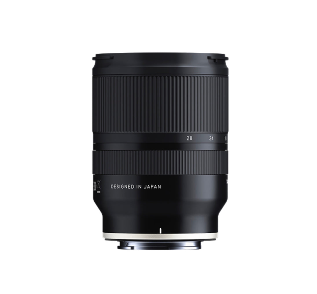 A side view of the Tamron 17-28mm F2.8 Di III RXD lens highlighting its ergonomic structure and the RXD autofocus motor